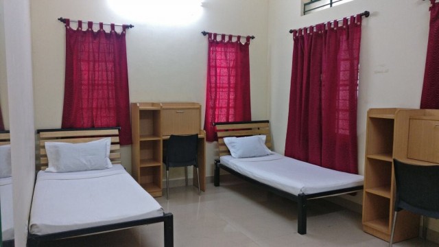 T John College Hostel Room