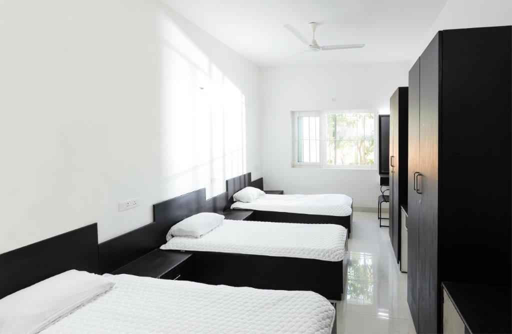 Firebird Institute of Research in Management Hostel Room(3)