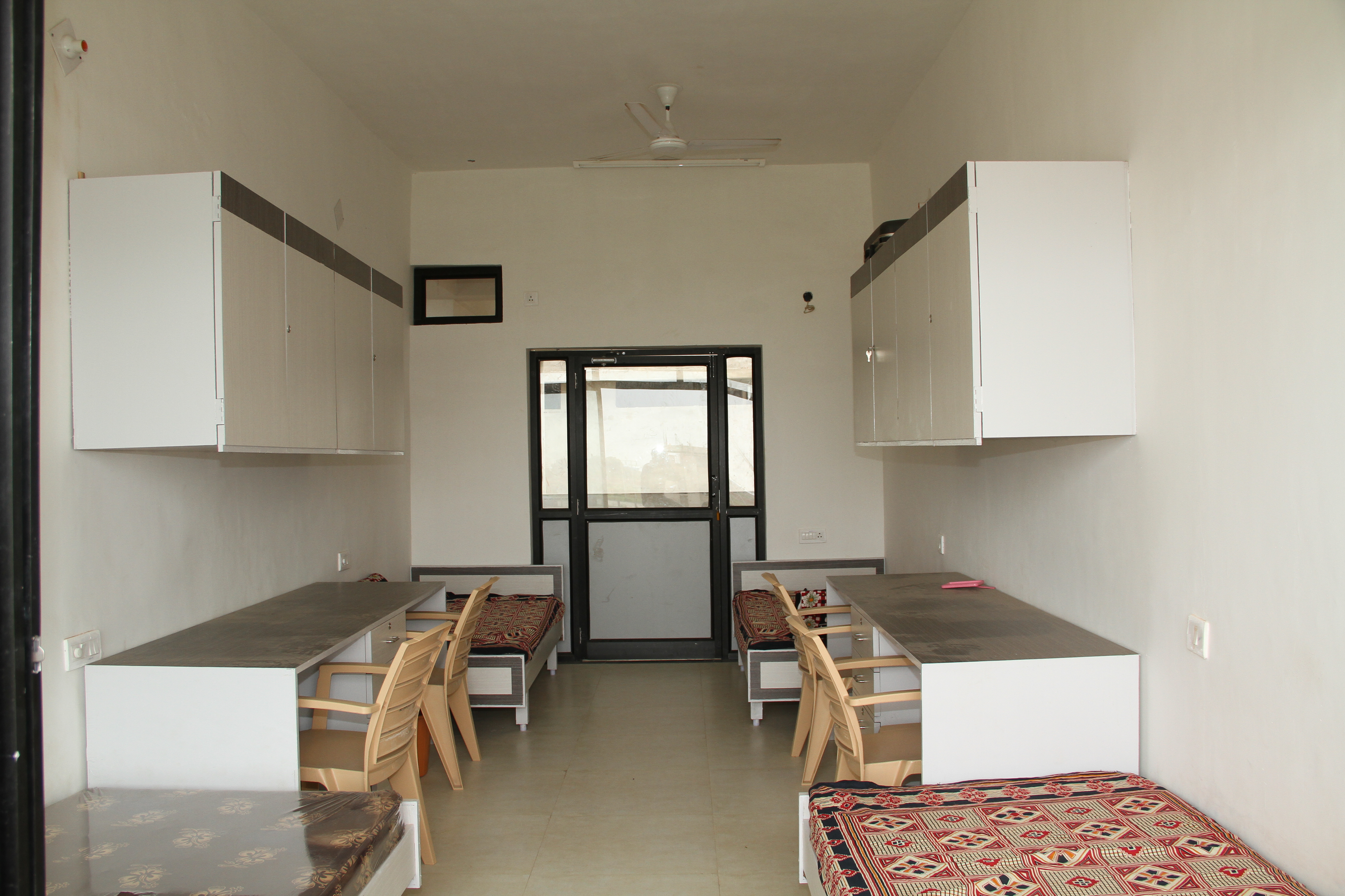 Gokul Global University Hostel Room